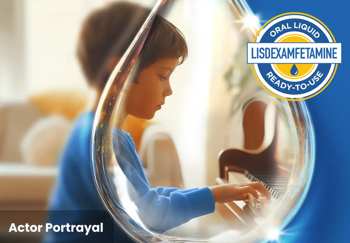 Boy in a blue shirt playing a piano, outlined with a drop shape. Logo in corner saying Oral Liquid Lisdexamfetamine Ready-to-Use.